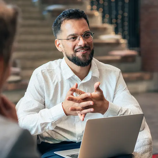 A meeting between Mondata’s team and a customer around a work table.